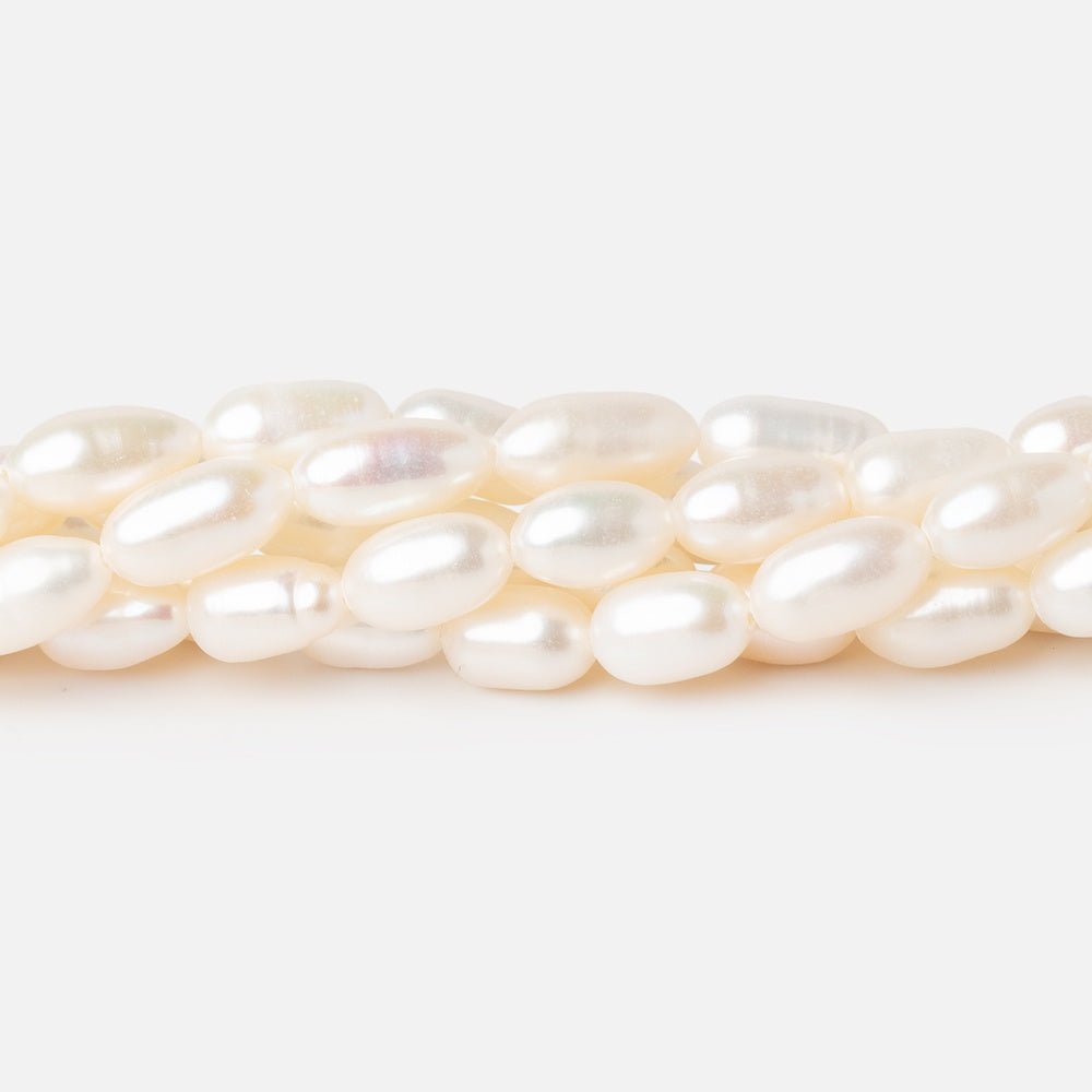 6.5 - 9mm Creamy White Oval Freshwater Pearls 15 inch 40 Beads - Beadsofcambay.com