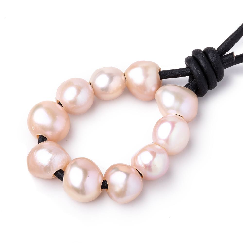 Peach Freshwater Pearl 10.5-11mm Smooth Round AAA Grade Pearl