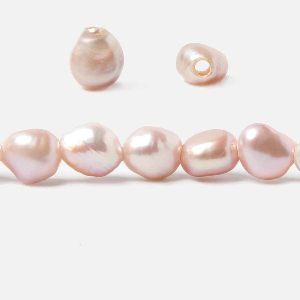 9.5x8-11x9.5mm Iced Pink Baroque 2.5mm large hole Pearls 15 in. 39 pcs - Beadsofcambay.com